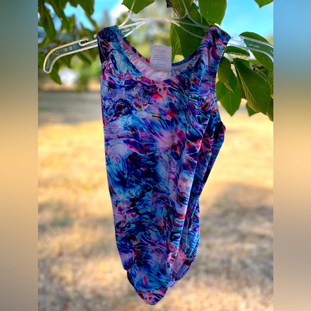 Colorful leotard Adult Medium, excellent condition. Motion Sports Brand